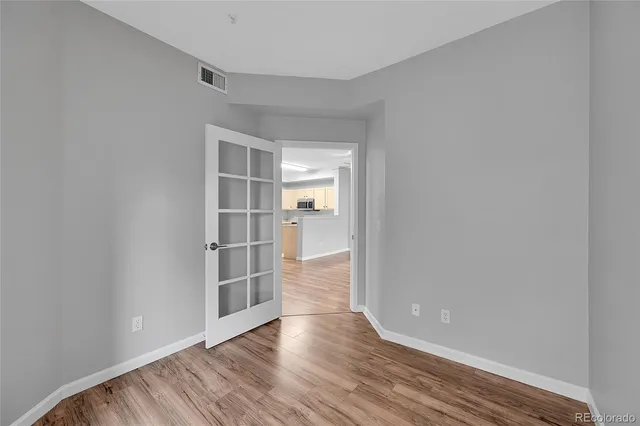 a white bath tub sitting next to a white toilet