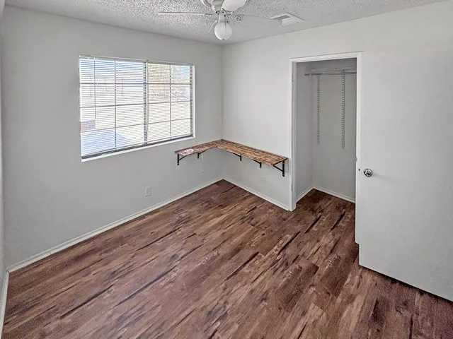 an empty room with windows