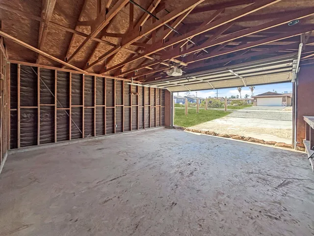 a view of a room with wooden walls