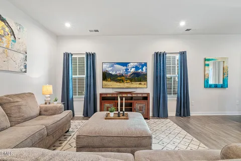 a living room with furniture and a couch