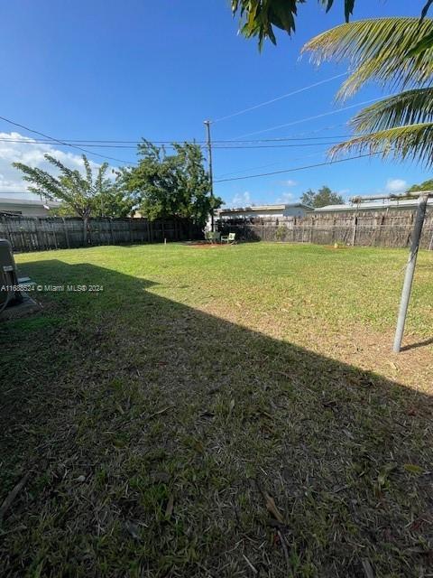 10791 Southwest 221st Street Miami, FL 33170 - Photo 16 of 18 a view of a field with an ocean