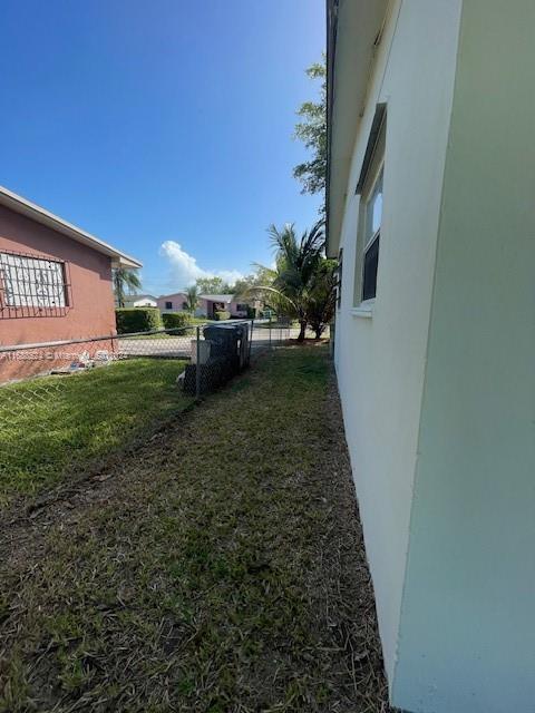 10791 Southwest 221st Street Miami, FL 33170 - Photo 17 of 18 a view of a backyard