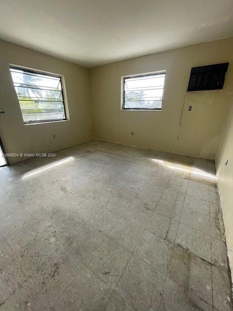 10791 Southwest 221st Street Miami, FL 33170 - Photo 3 of 18 an empty room with windows