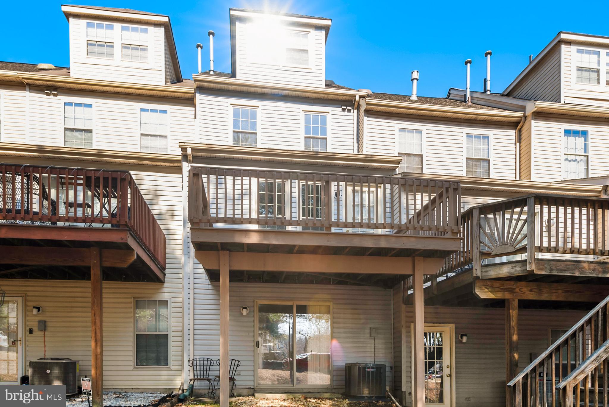 43 Bank Spring Court Owings Mills, MD 21117 - Photo 26 of 27 a front view of a house with a balcony