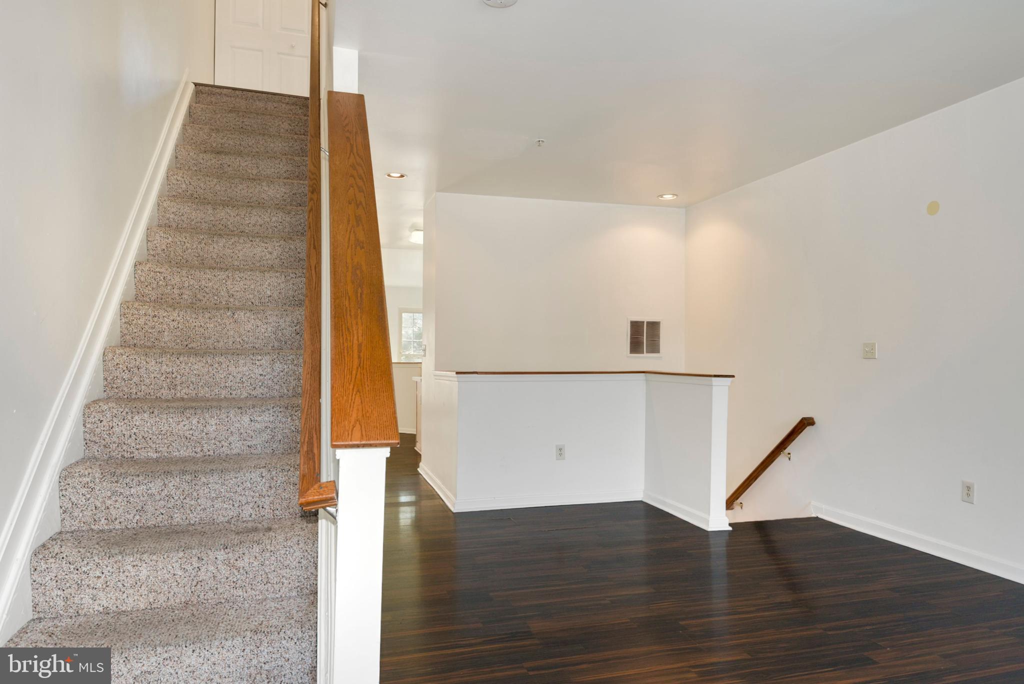 43 Bank Spring Court Owings Mills, MD 21117 - Photo 9 of 27 a view of entryway with wooden floor