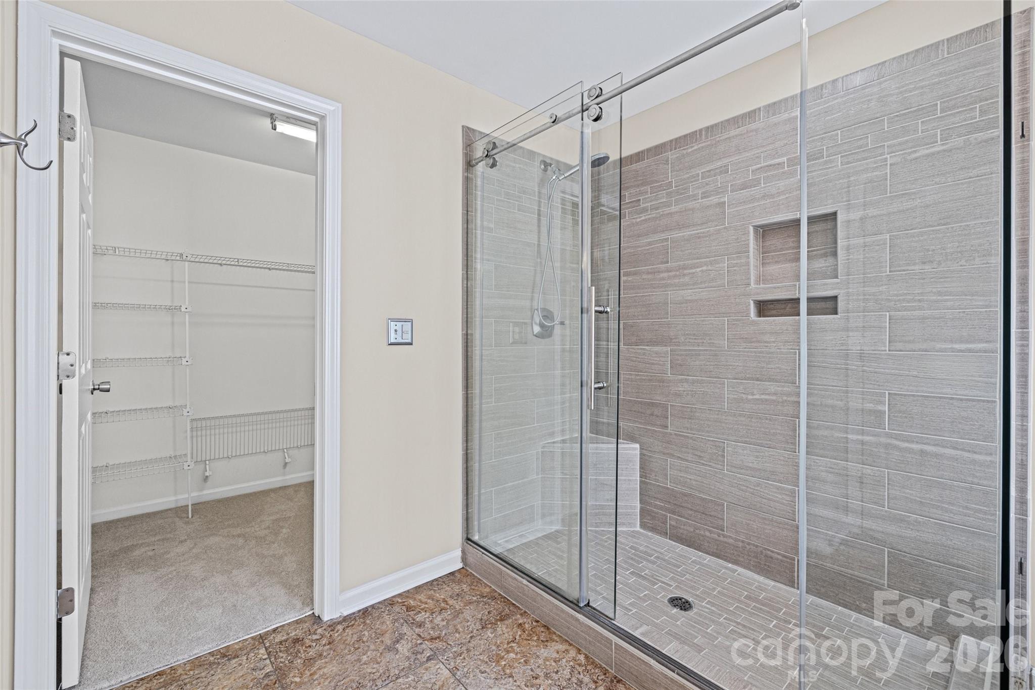 620 East Cheval Drive Fort Mill, SC 29708 - Photo 27 of 48 a bathroom with a glass shower door