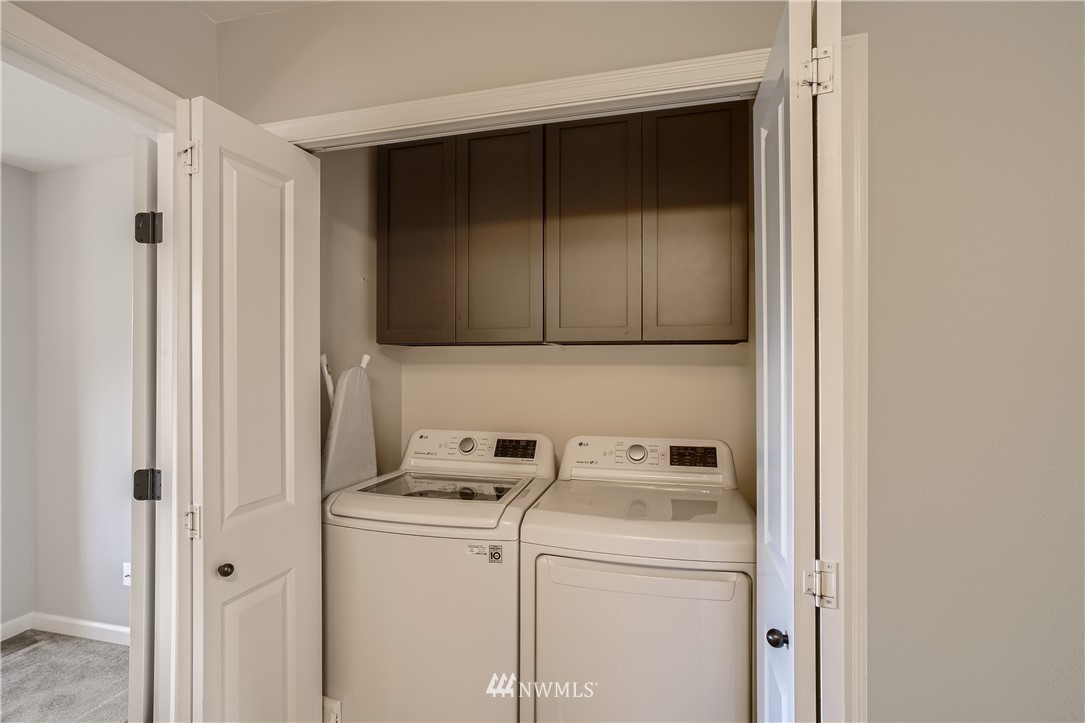 320 Chelan Place Northeast, Unit H3 Renton, WA 98059 - Photo 22 of 28 a utility room with dryer and washer