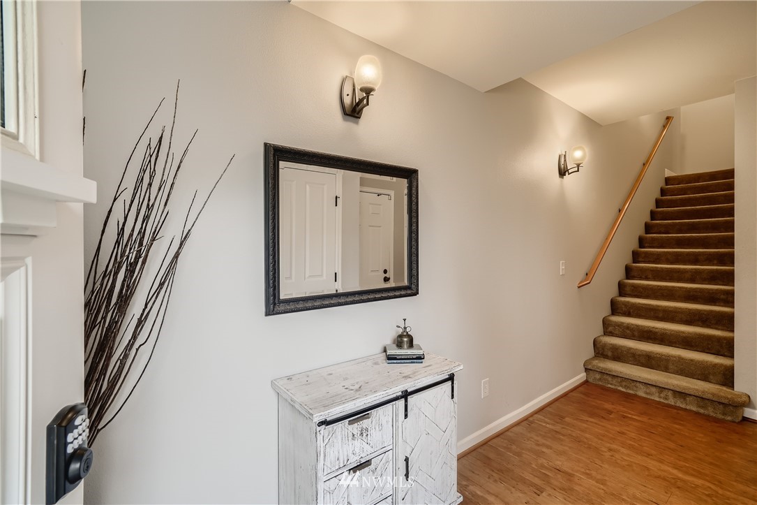 320 Chelan Place Northeast, Unit H3 Renton, WA 98059 - Photo 24 of 28 a view of a hallway with staircase