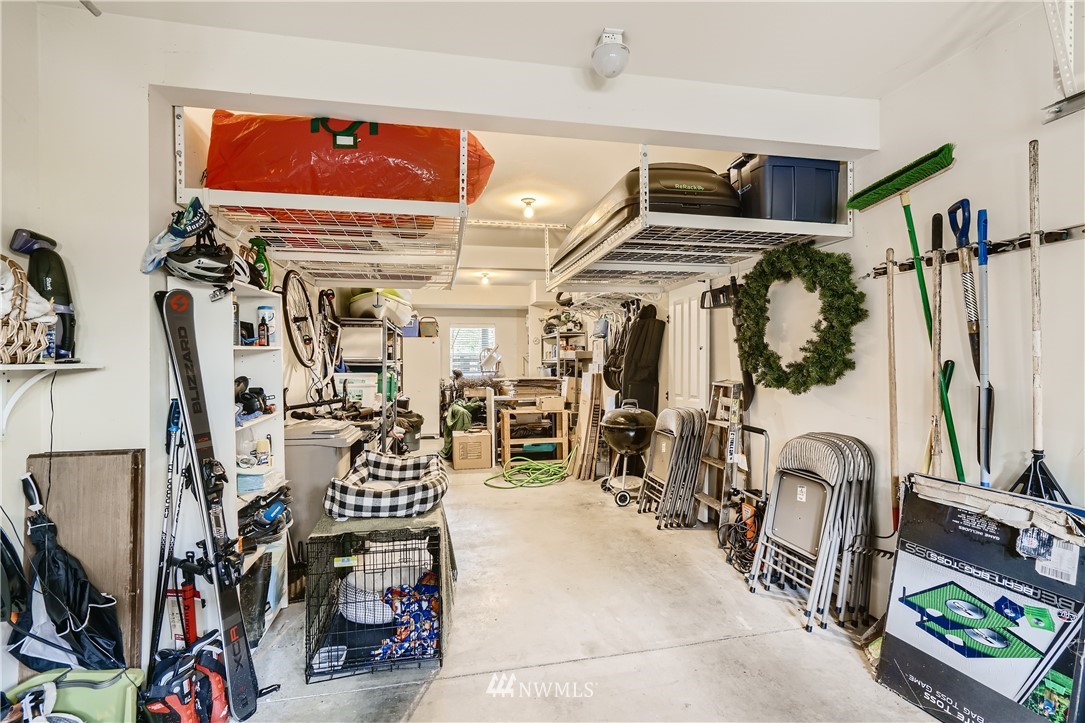 320 Chelan Place Northeast, Unit H3 Renton, WA 98059 - Photo 25 of 28 a view of walk in closet with clothes and shoes