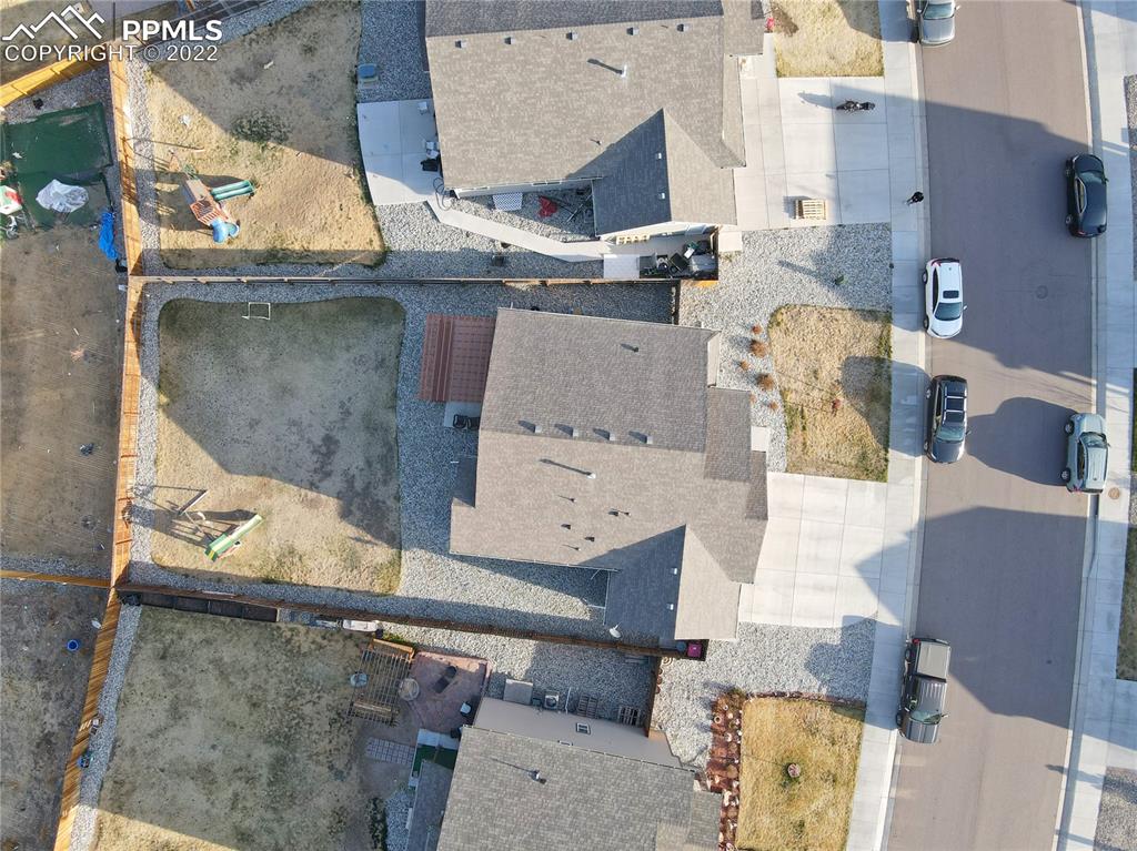6729 Kearsarge Drive Colorado Springs, CO 80925 - Photo 3 of 22 an aerial view of residential houses with outdoor space