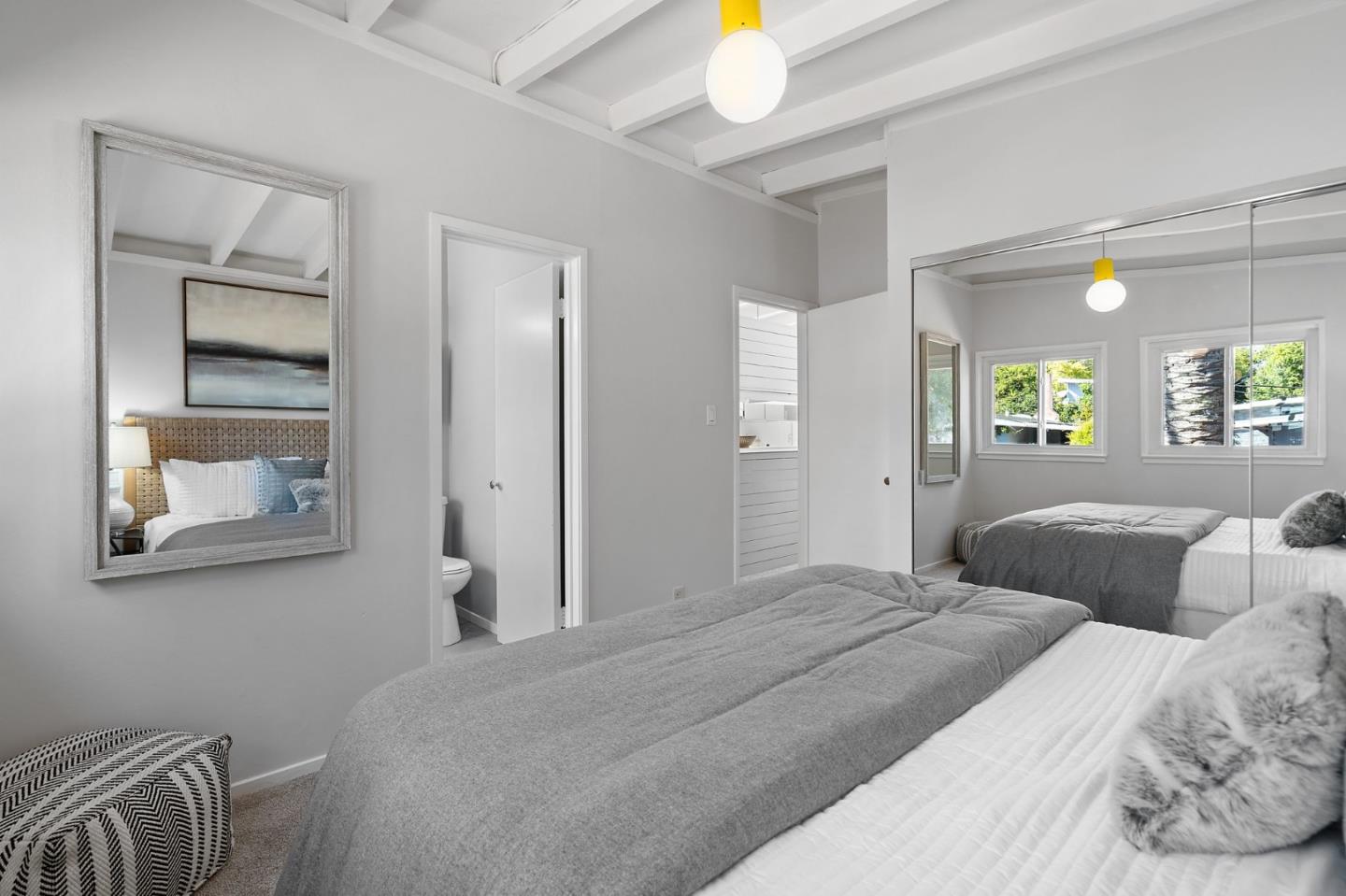 2409 Laura Lane Mountain View, CA 94043 - Photo 14 of 26 a bedroom with a bed and a chandelier