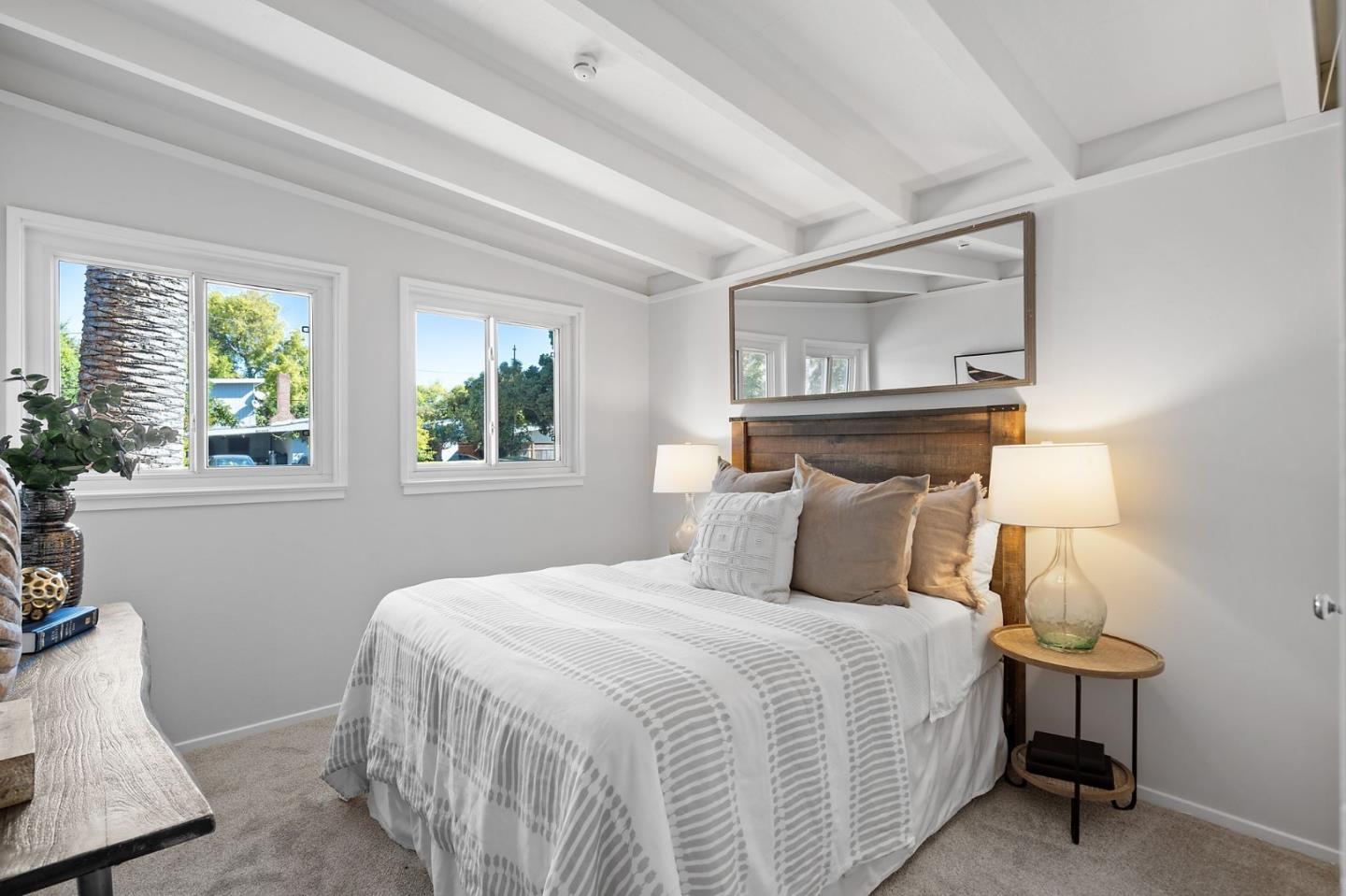2409 Laura Lane Mountain View, CA 94043 - Photo 17 of 26 a bedroom with a bed and a window