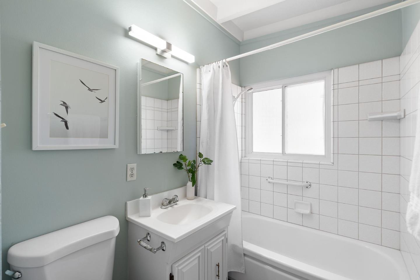 2409 Laura Lane Mountain View, CA 94043 - Photo 20 of 26 a bathroom with a toilet a sink and a bathtub