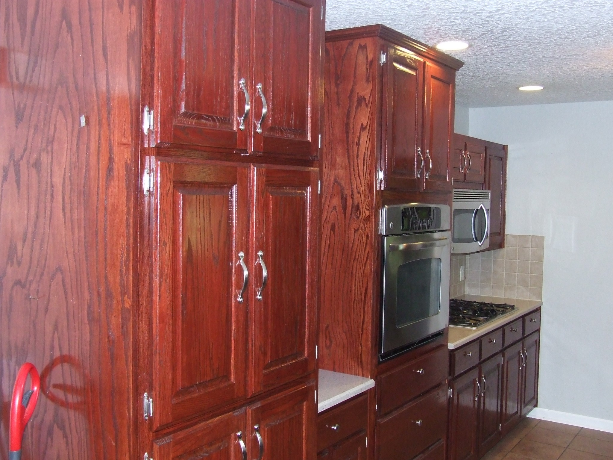 60 Sneed Road McMinnville, TN 37110 - Photo 11 of 30 a kitchen with stainless steel appliances a refrigerator and cabinets