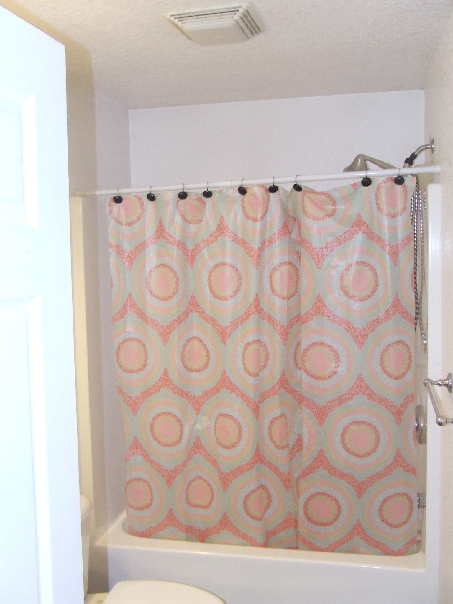 60 Sneed Road McMinnville, TN 37110 - Photo 13 of 30 a bathroom with a bathtub and a shower curtain
