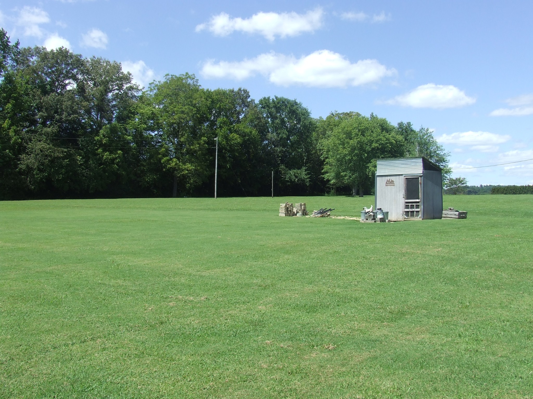 60 Sneed Road McMinnville, TN 37110 - Photo 26 of 30 a view of a house with a backyard