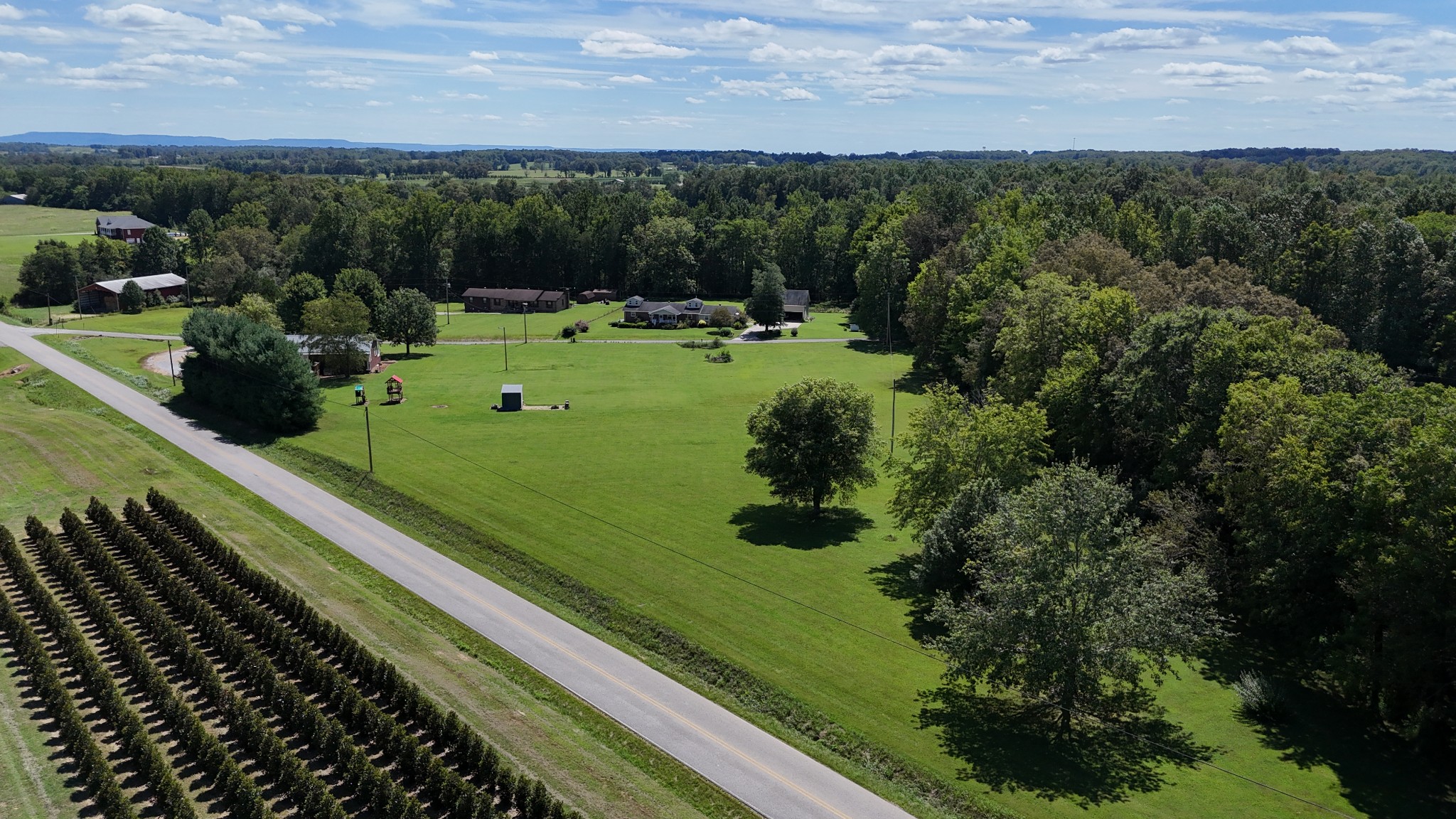 60 Sneed Road McMinnville, TN 37110 - Photo 7 of 30 a view of a green field with sitting area