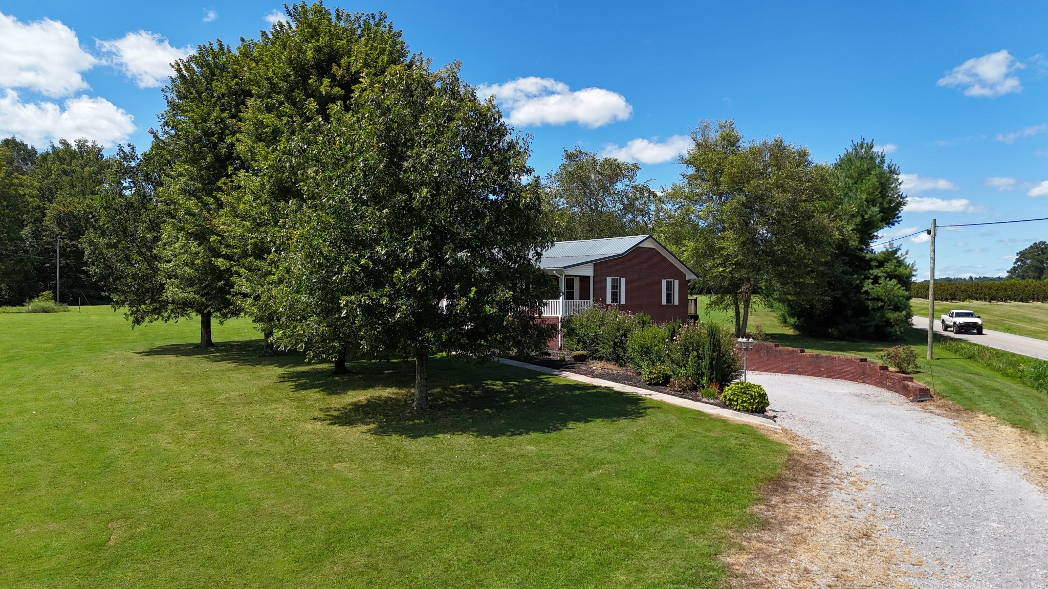 60 Sneed Road McMinnville, TN 37110 - Photo 9 of 30 a front view of a house with garden