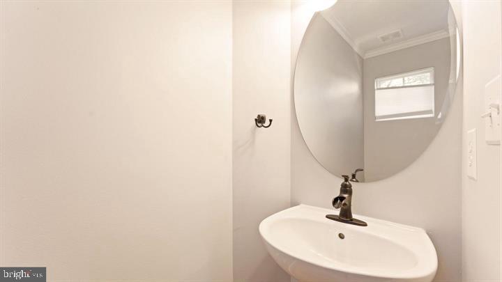 1918 Crescent Park Drive Reston, VA 20190 - Photo 27 of 33 Sleek and modern half-bath retreat.