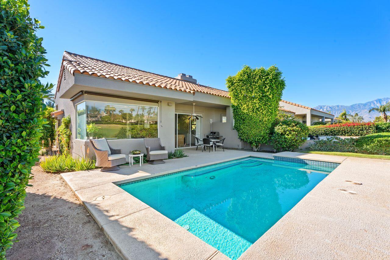 6 Pebble Beach Drive Rancho Mirage, CA 92270 - Photo 24 of 44 a view of a house with swimming pool and sitting area