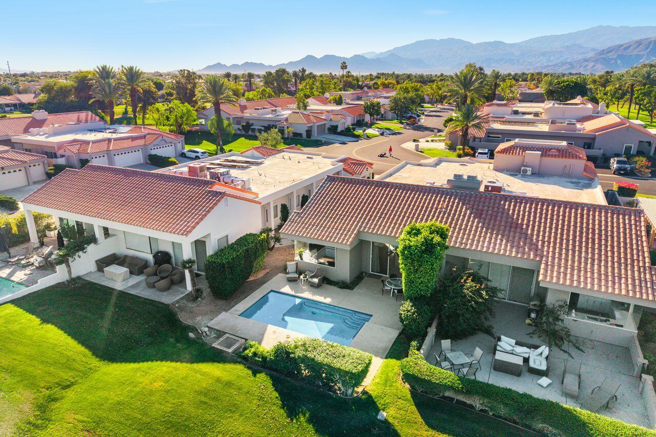 6 Pebble Beach Drive Rancho Mirage, CA 92270 - Photo 31 of 46 an aerial view of residential houses with outdoor space and trees