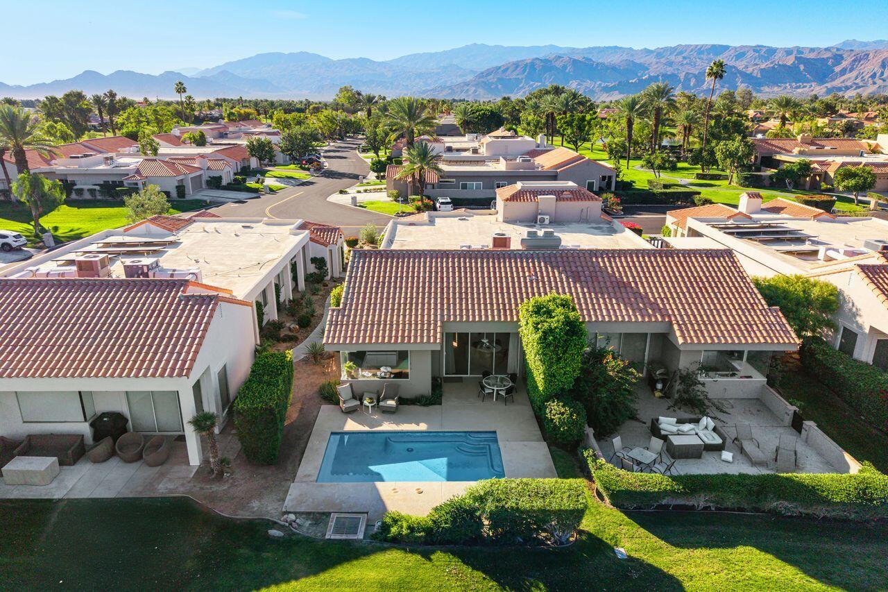 6 Pebble Beach Drive Rancho Mirage, CA 92270 - Photo 31 of 44 an aerial view of a house with garden space and swimming pool