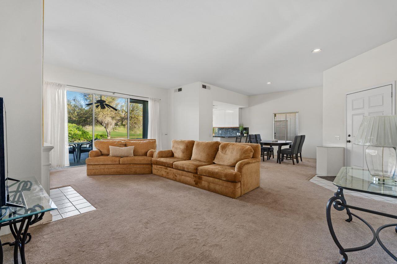6 Pebble Beach Drive Rancho Mirage, CA 92270 - Photo 5 of 44 a living room with furniture and a large window