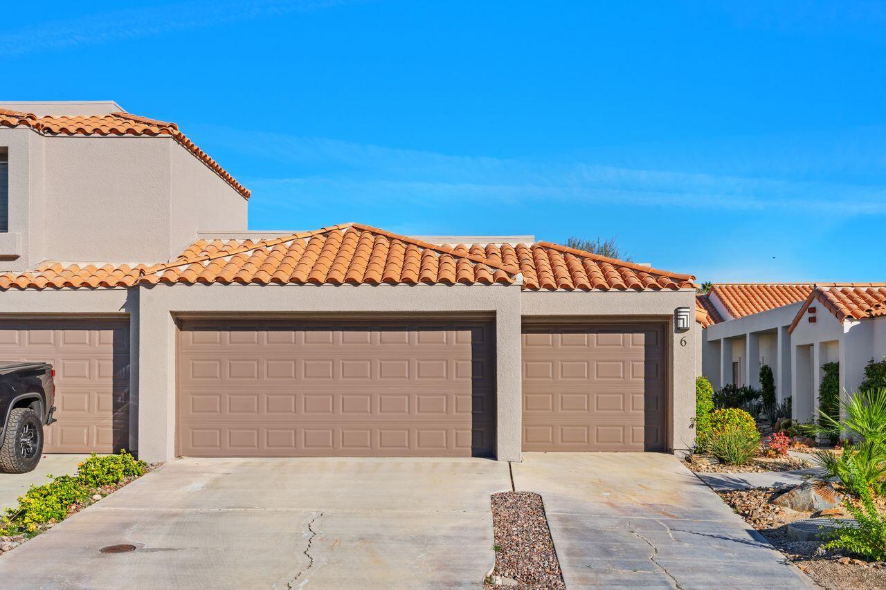 6 Pebble Beach Drive Rancho Mirage, CA 92270 - Photo 7 of 46 a front view of a house with entryway