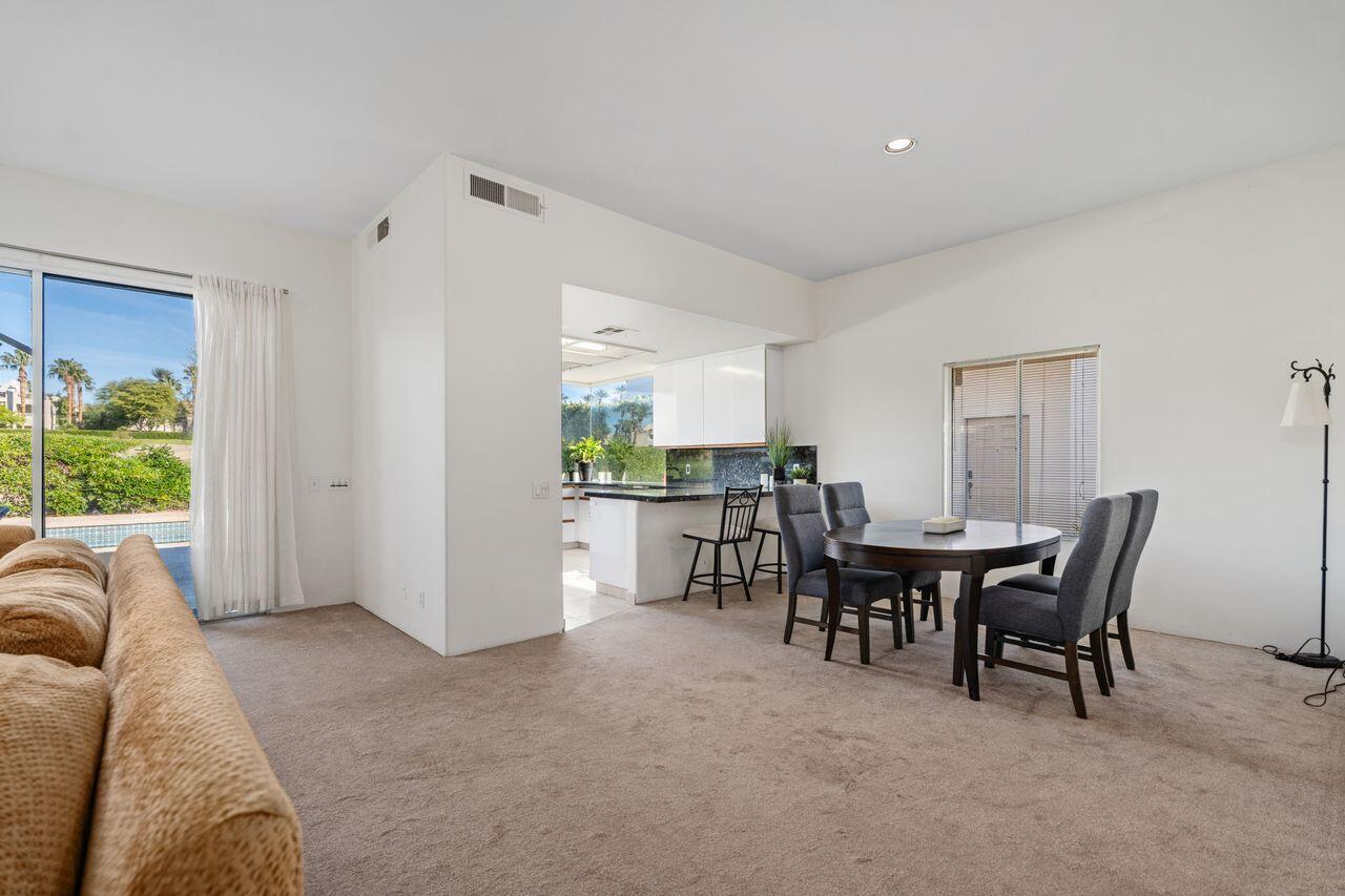 6 Pebble Beach Drive Rancho Mirage, CA 92270 - Photo 7 of 44 a view of a livingroom with furniture and a window