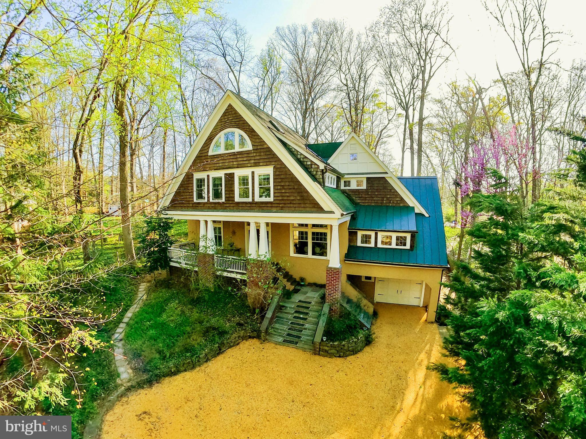 6306 Valley Road Bethesda, MD 20817 - Photo 1 of 74 a front view of a house with a yard and trees
