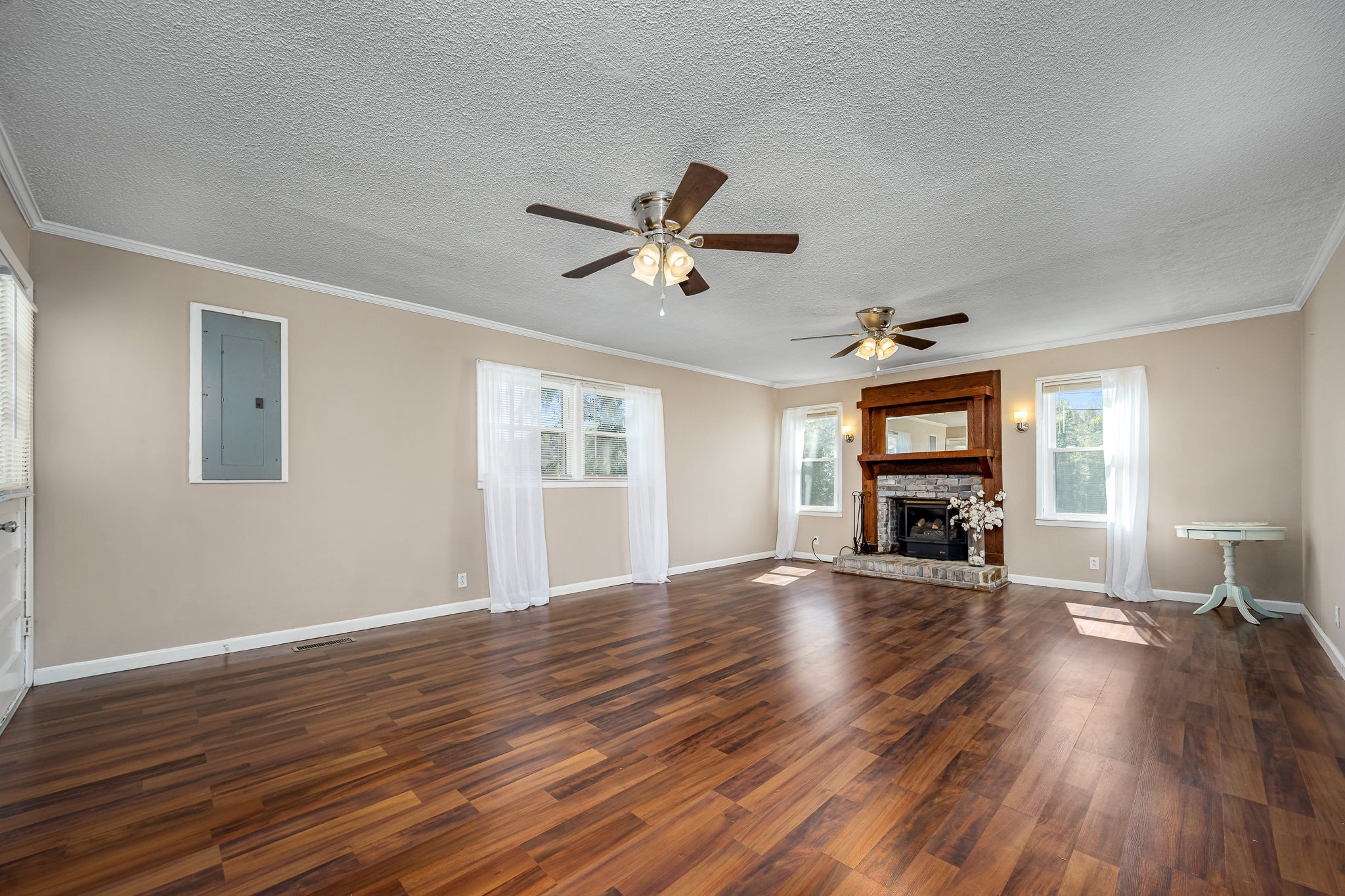 8 West Point Drive Fayetteville, TN 37334 - Photo 14 of 45 a view of a livingroom with furniture a ceiling fan and wooden floor