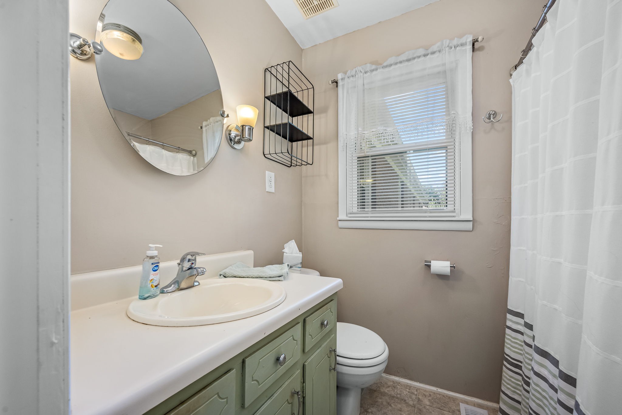 8 West Point Drive Fayetteville, TN 37334 - Photo 21 of 45 a bathroom with a sink and a mirror