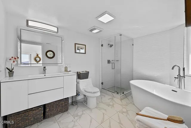 a white bath tub sitting in a bathroom