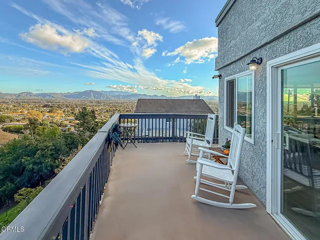a view of a house with a ocean view