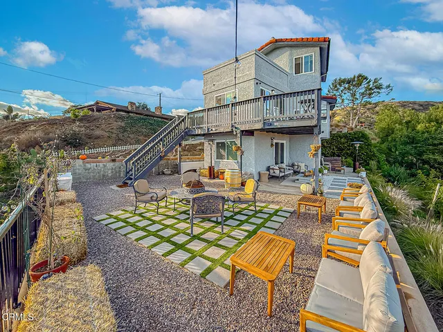 a view of a road with a building in the background