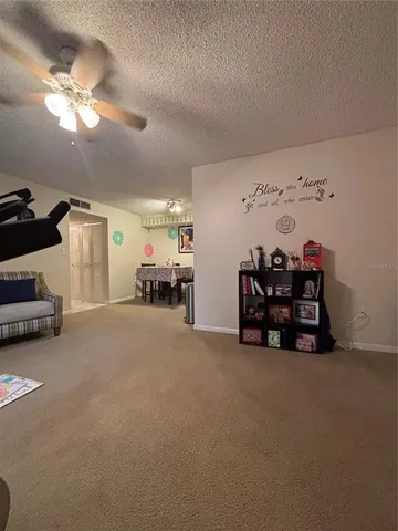 a view of livingroom with furniture