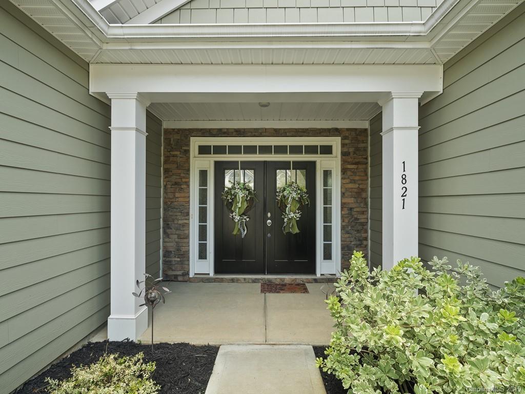 1821 Larkspur Way Tega Cay, SC 29708 - Photo 1 of 26 a view of a door of the house
