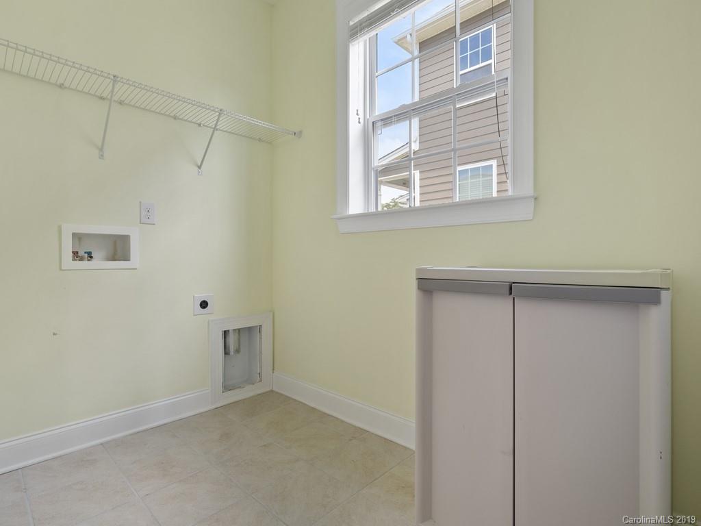 1821 Larkspur Way Tega Cay, SC 29708 - Photo 14 of 26 a view of an empty room with a window