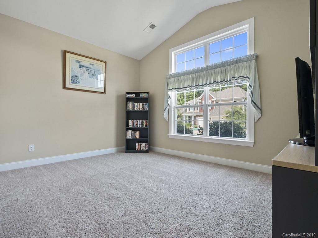 1821 Larkspur Way Tega Cay, SC 29708 - Photo 16 of 26 a view of an empty room with a window