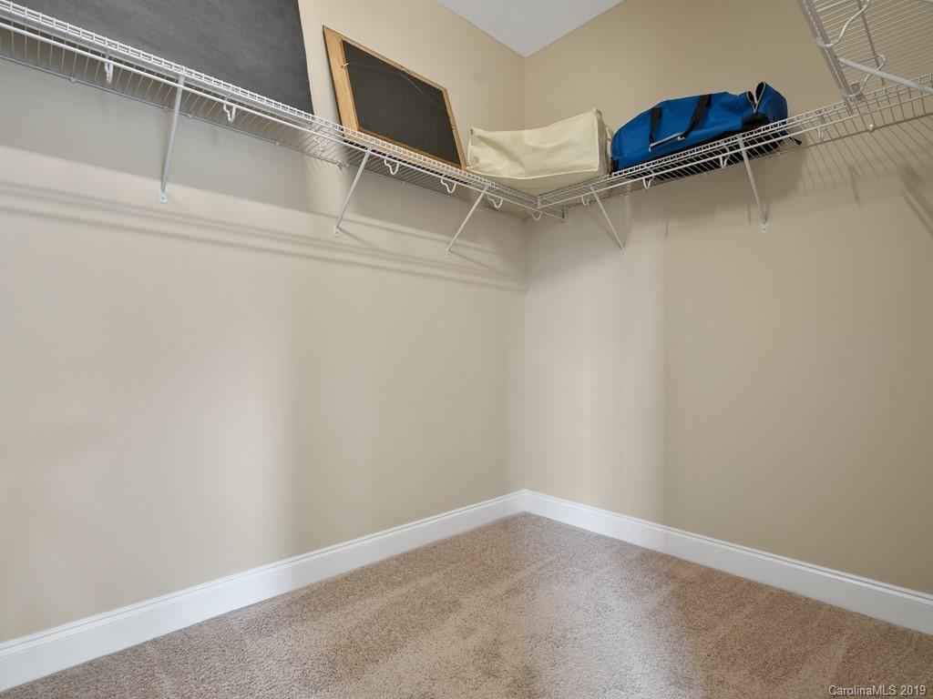 1821 Larkspur Way Tega Cay, SC 29708 - Photo 23 of 26 a view of an empty walk in closet