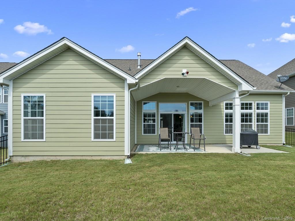 1821 Larkspur Way Tega Cay, SC 29708 - Photo 25 of 26 a front view of a house with a yard