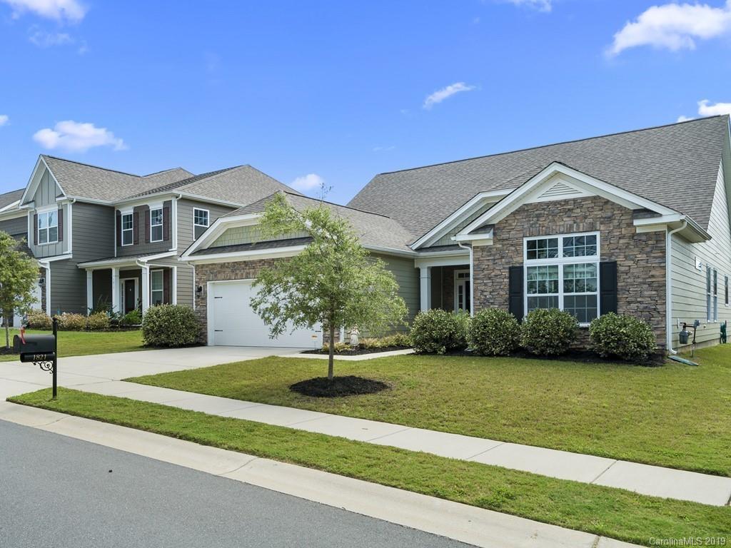 1821 Larkspur Way Tega Cay, SC 29708 - Photo 26 of 26 a front view of a house with a yard