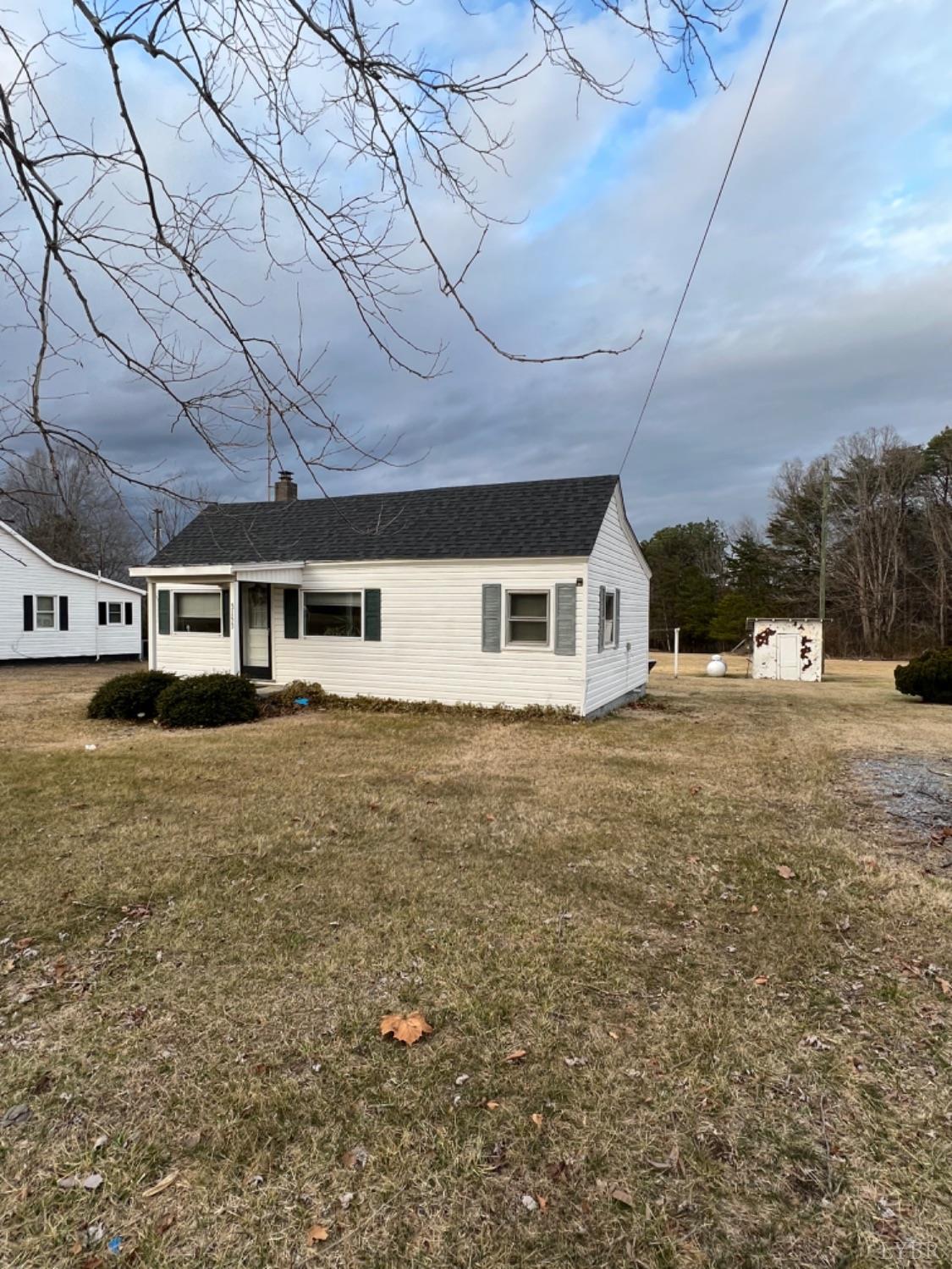 3153 Grit Road Hurt, VA 24563 - Photo 1 of 13 a front view of a house with a yard