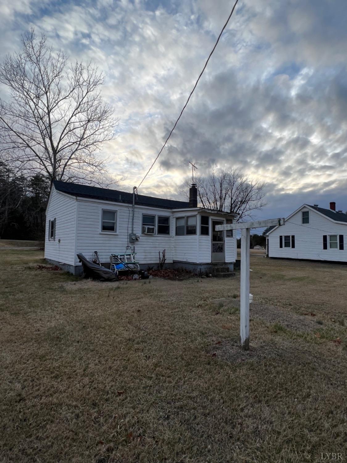 3153 Grit Road Hurt, VA 24563 - Photo 3 of 13 a view of a house with a backyard