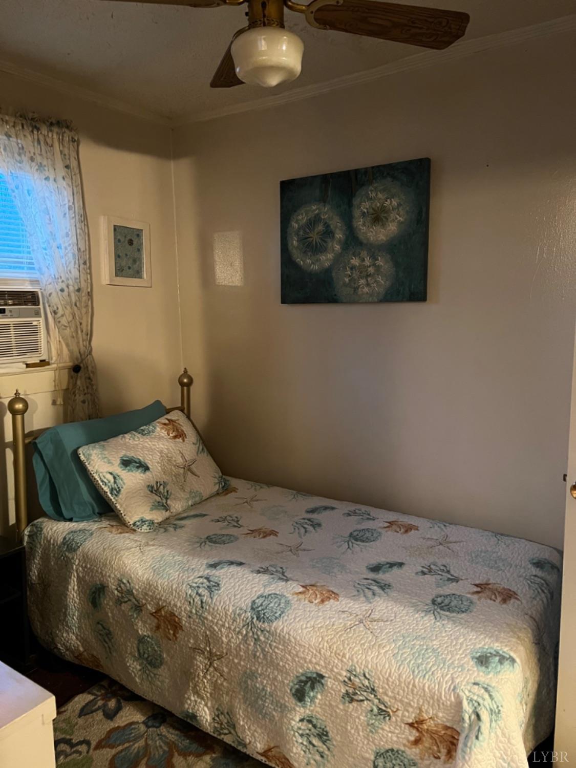 3153 Grit Road Hurt, VA 24563 - Photo 9 of 13 a bedroom with a bed and a painting on the wall