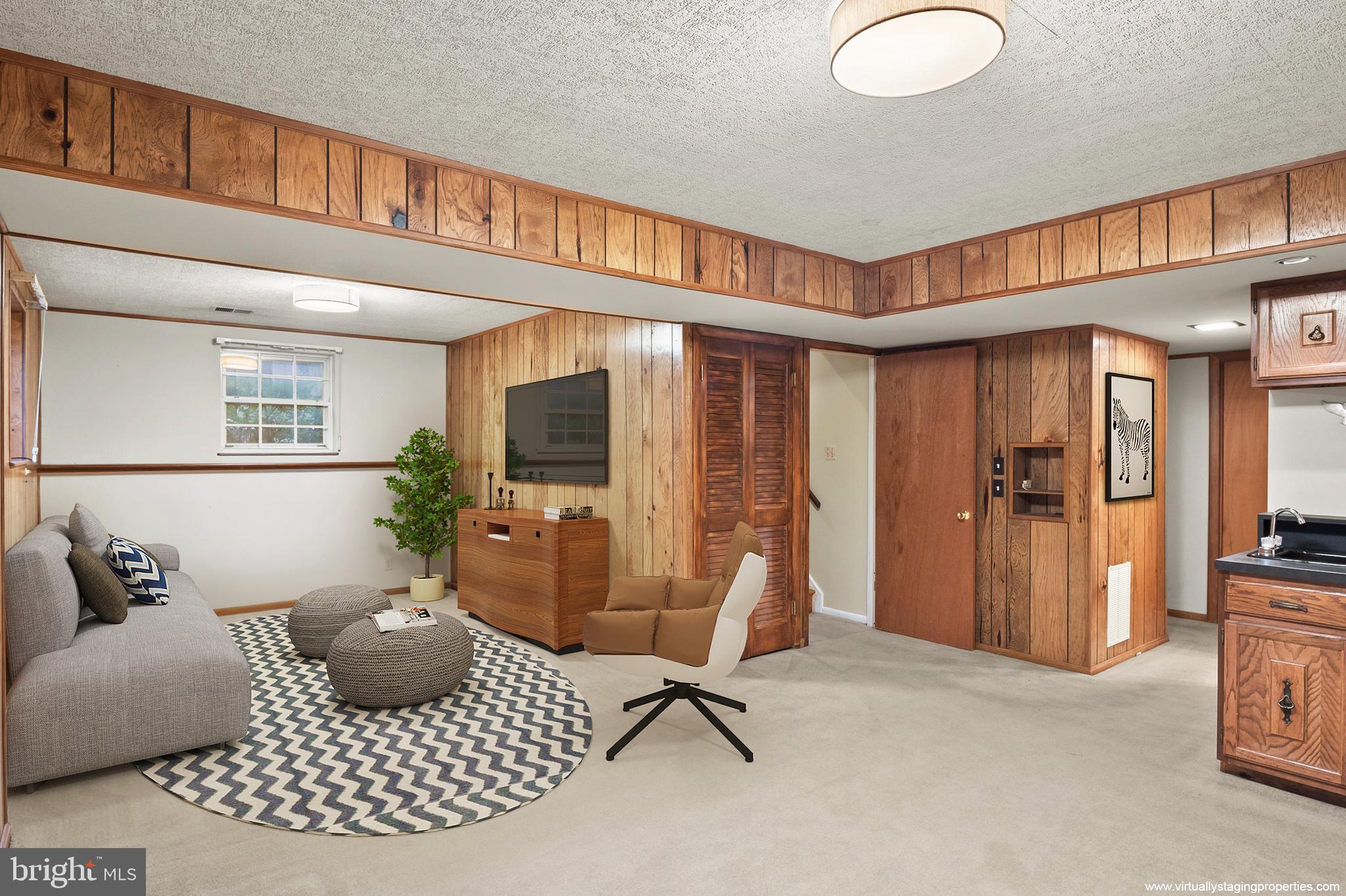 3724 Nile Road Davidsonville, MD 21035 - Photo 6 of 36 Virtual staged family room lower level
