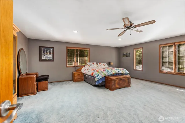 a bedroom with furniture and a bed