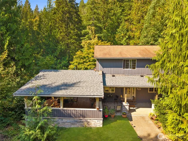 a view of a tree with a yard