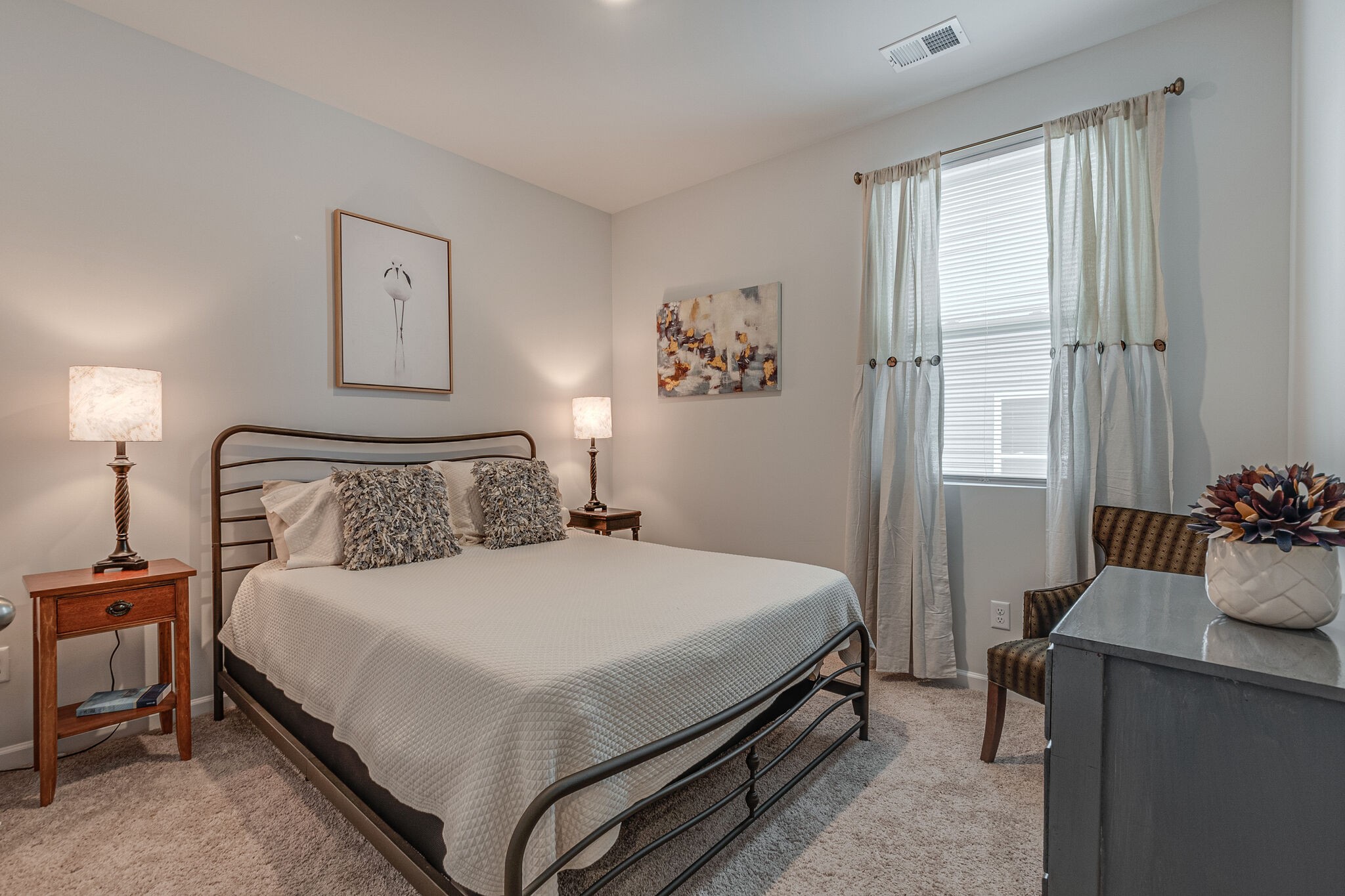 1122 Woodbridge Boulevard Lebanon, TN 37090 - Photo 22 of 30 a bedroom with a bed and a table in it