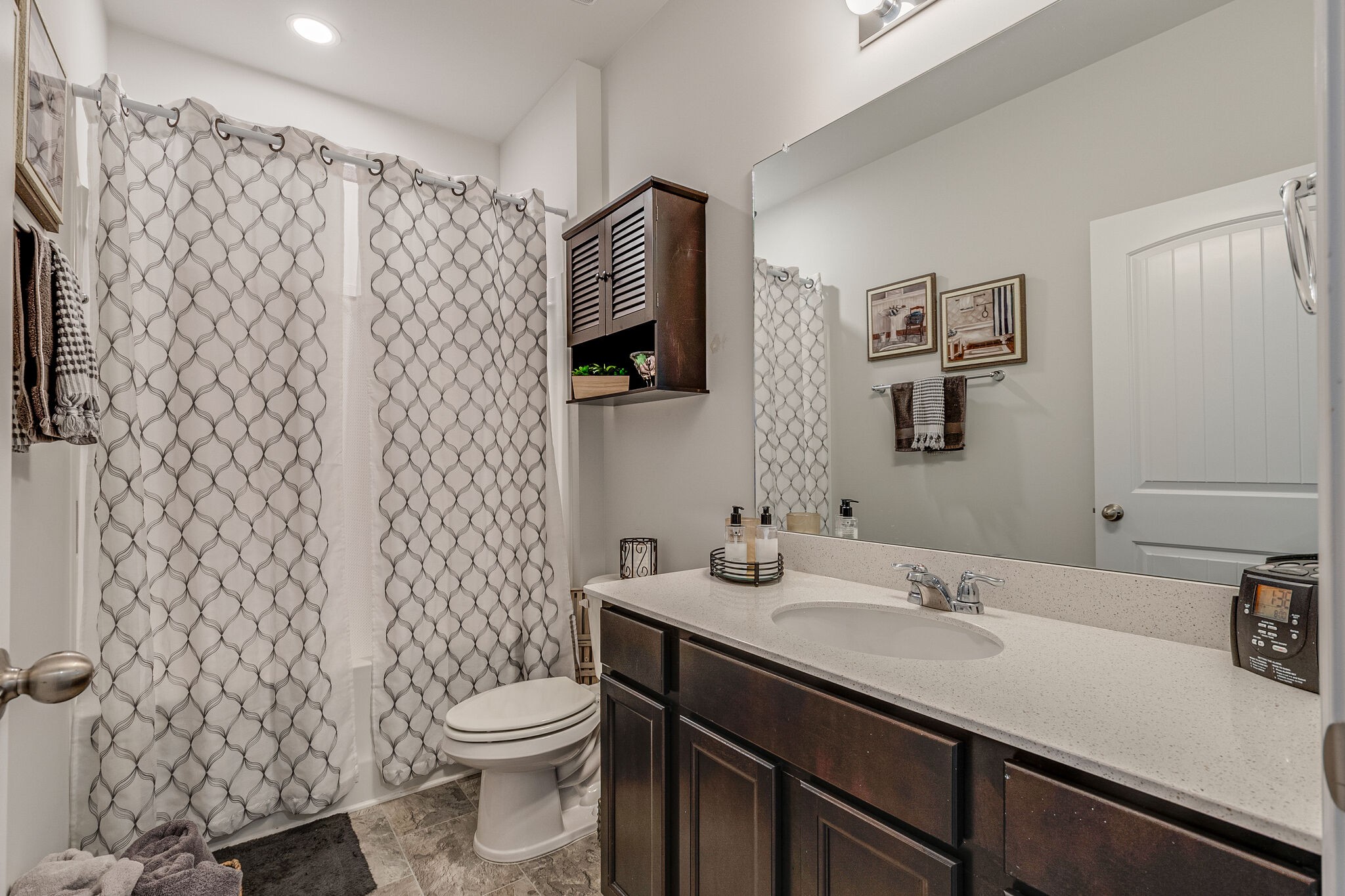 1122 Woodbridge Boulevard Lebanon, TN 37090 - Photo 23 of 30 a bathroom with a sink toilet and mirror